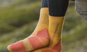 Danish Endurance Merino Wool Hiking socks hanging off a deck