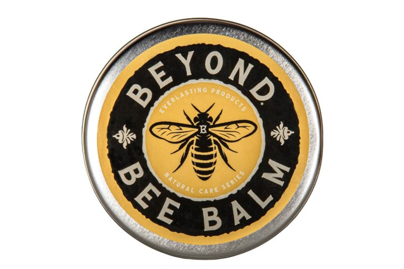 Tin of Beyond Bee Balm Waterproofing on a white background.