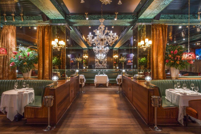 Your guide to the best Miami vacation - The Manual 16 Booths inside Carbone restaurant