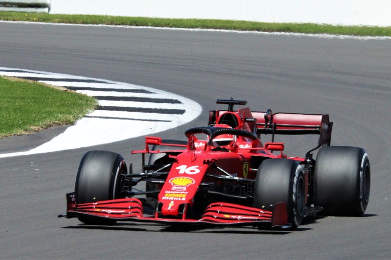 Formula 1 driver exiting turn.