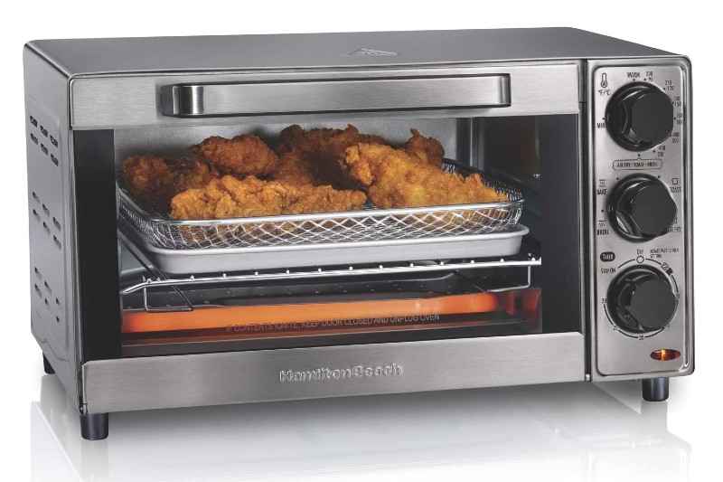 Cooking chicken in the Hamilton Beach Sure-Crisp Air Fryer Countertop Toaster Oven.