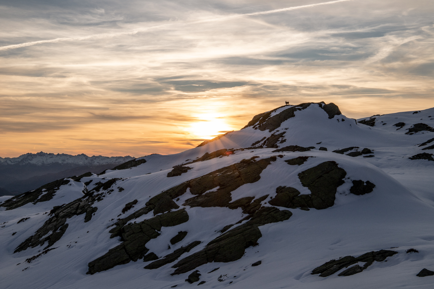 Snow-covered mountainside, France.