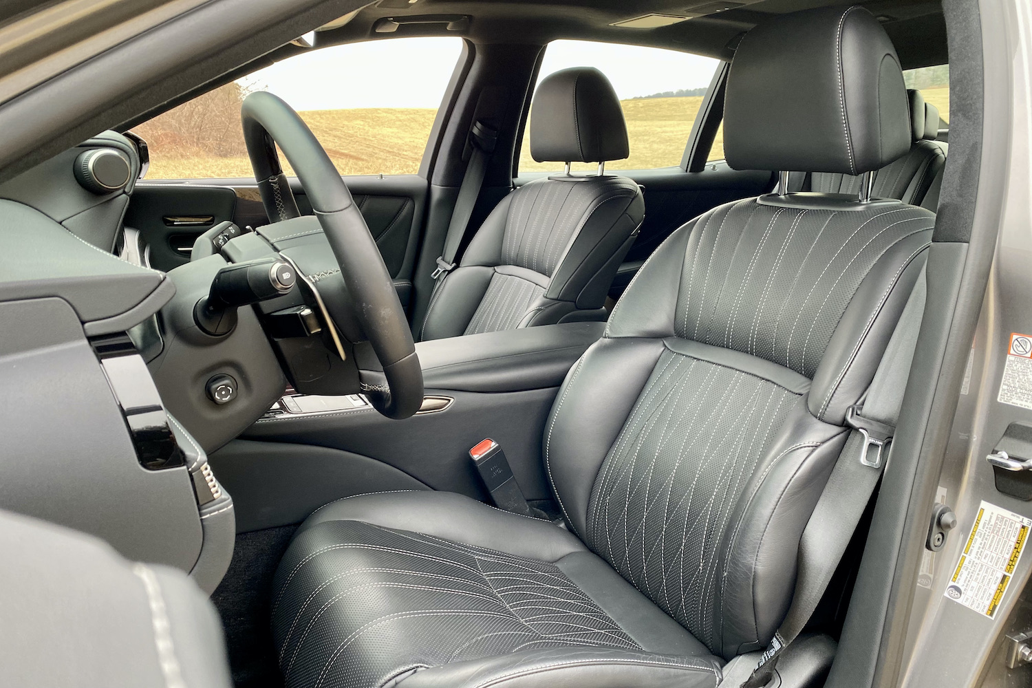 The driver's seat of the 2021 Lexus LS500 from outside.