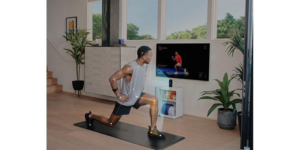 A man using Tempo Move in front of his TV.
