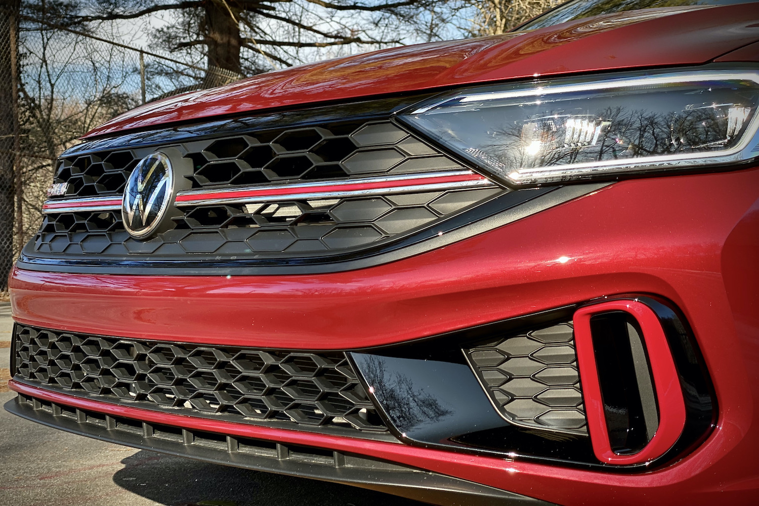 Close up of 2022 Volkswagen Jetta front end grille and headlights.