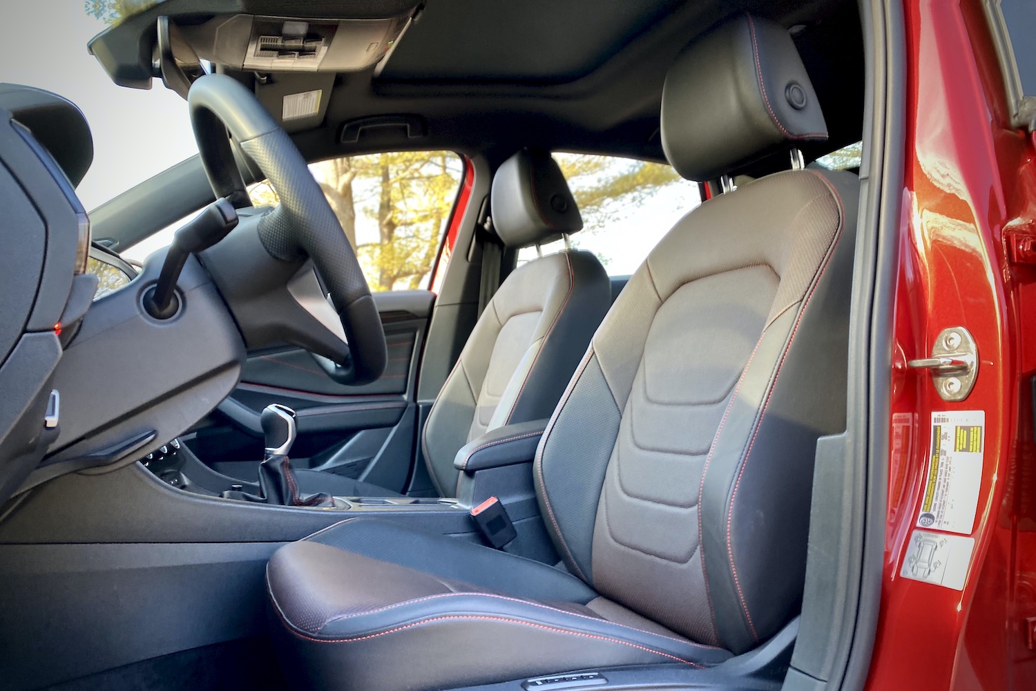 Close up of driver's seat in 2022 Volkswagen Jetta GLI from outside.