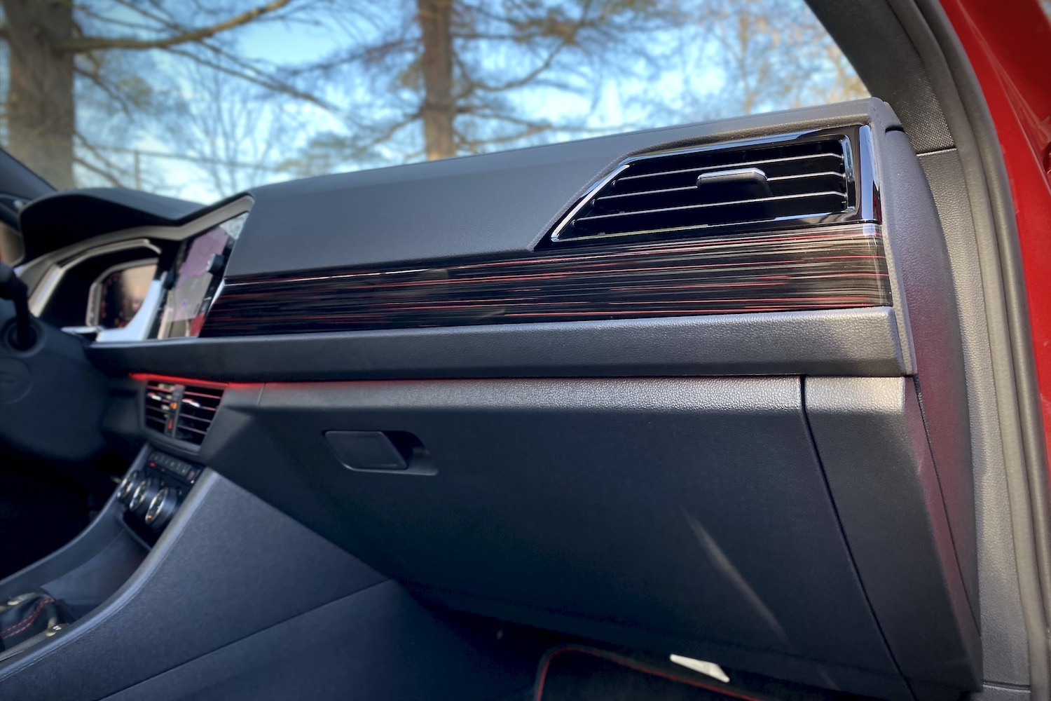 Close up of 2022 Volkswagen Jetta GLI trim piece on dashboard.