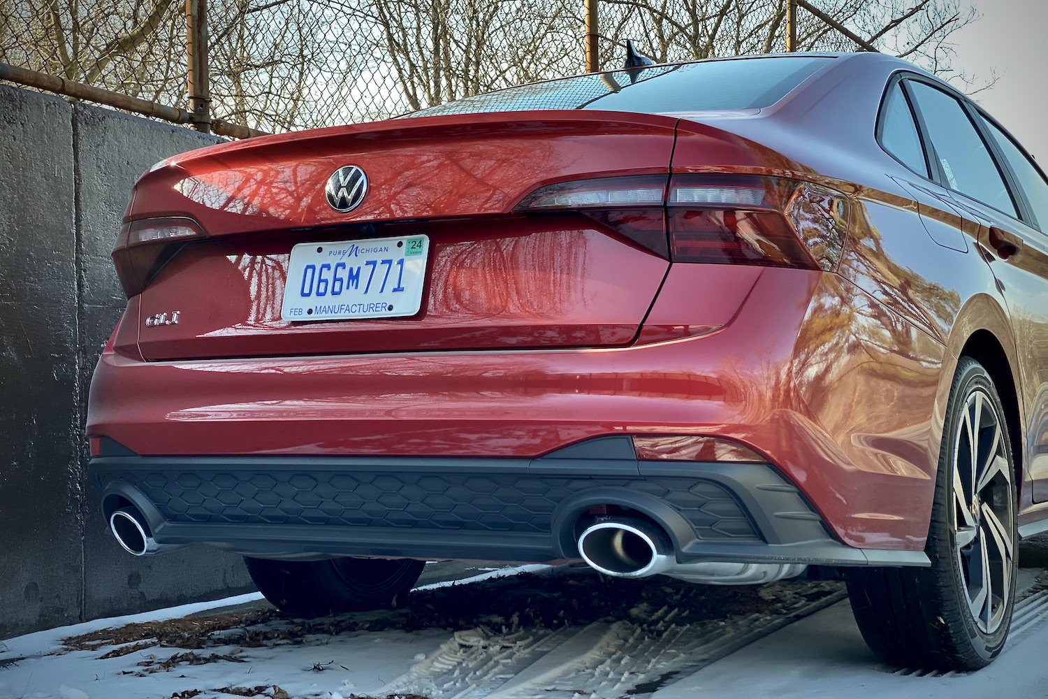 Close up of 2022 Volkswagen Jetta GLI rear end from passenger side.