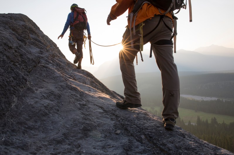 Two people hiking together