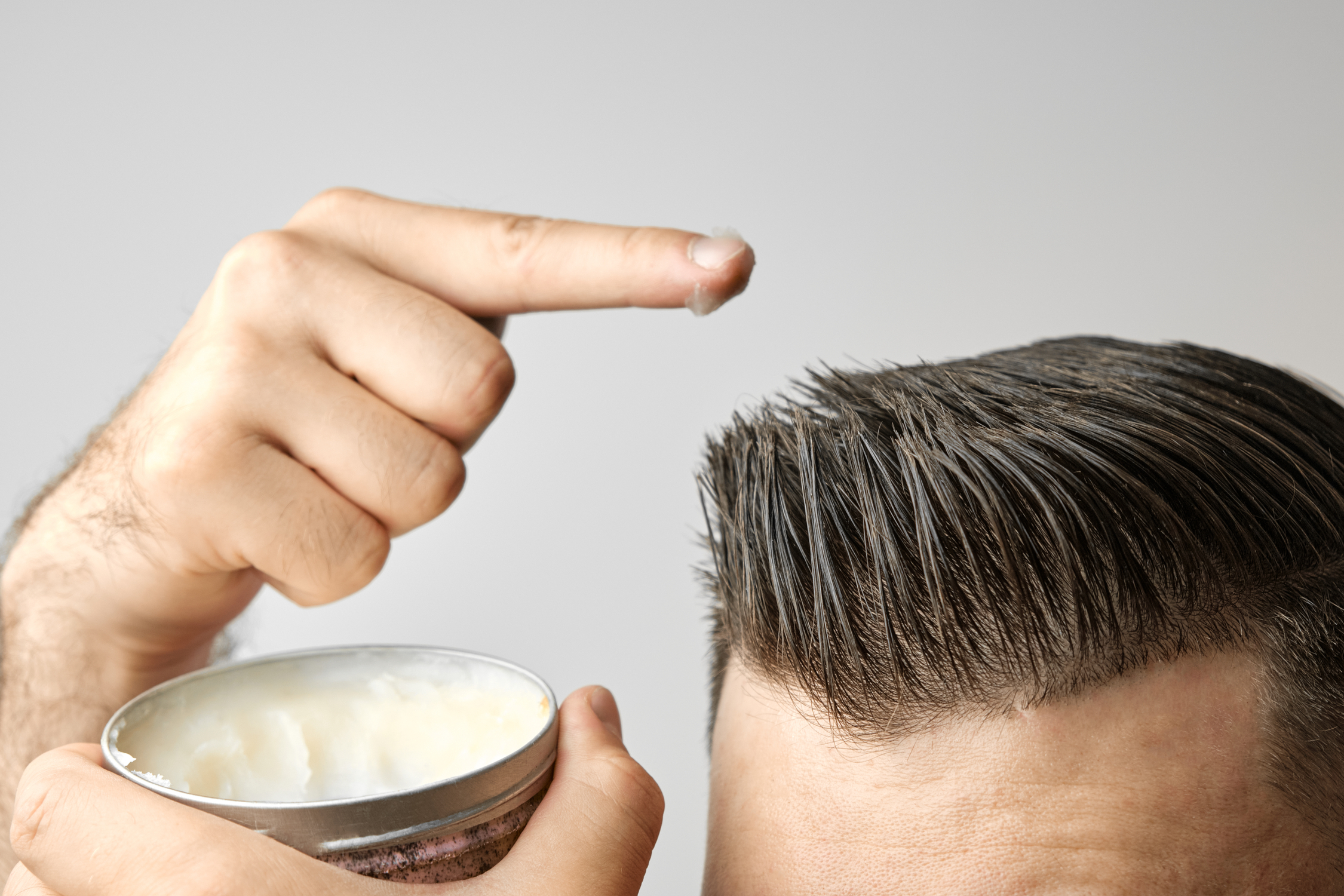 Man applying pomade