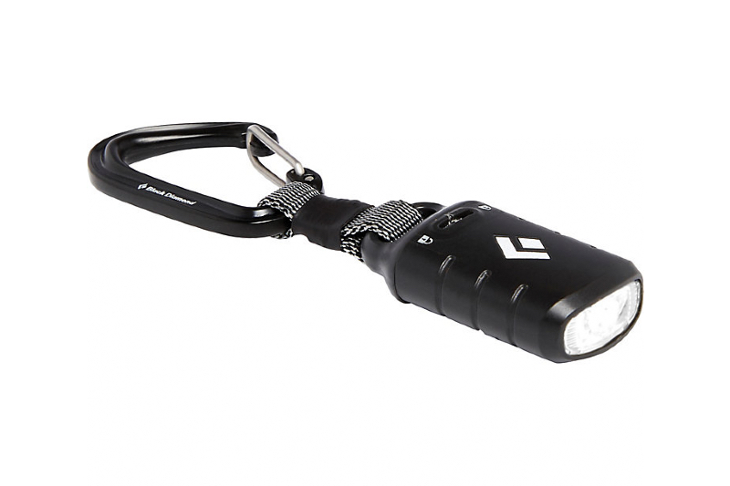 Black Diamond Ion Keychain Light and carabiner on a white background.
