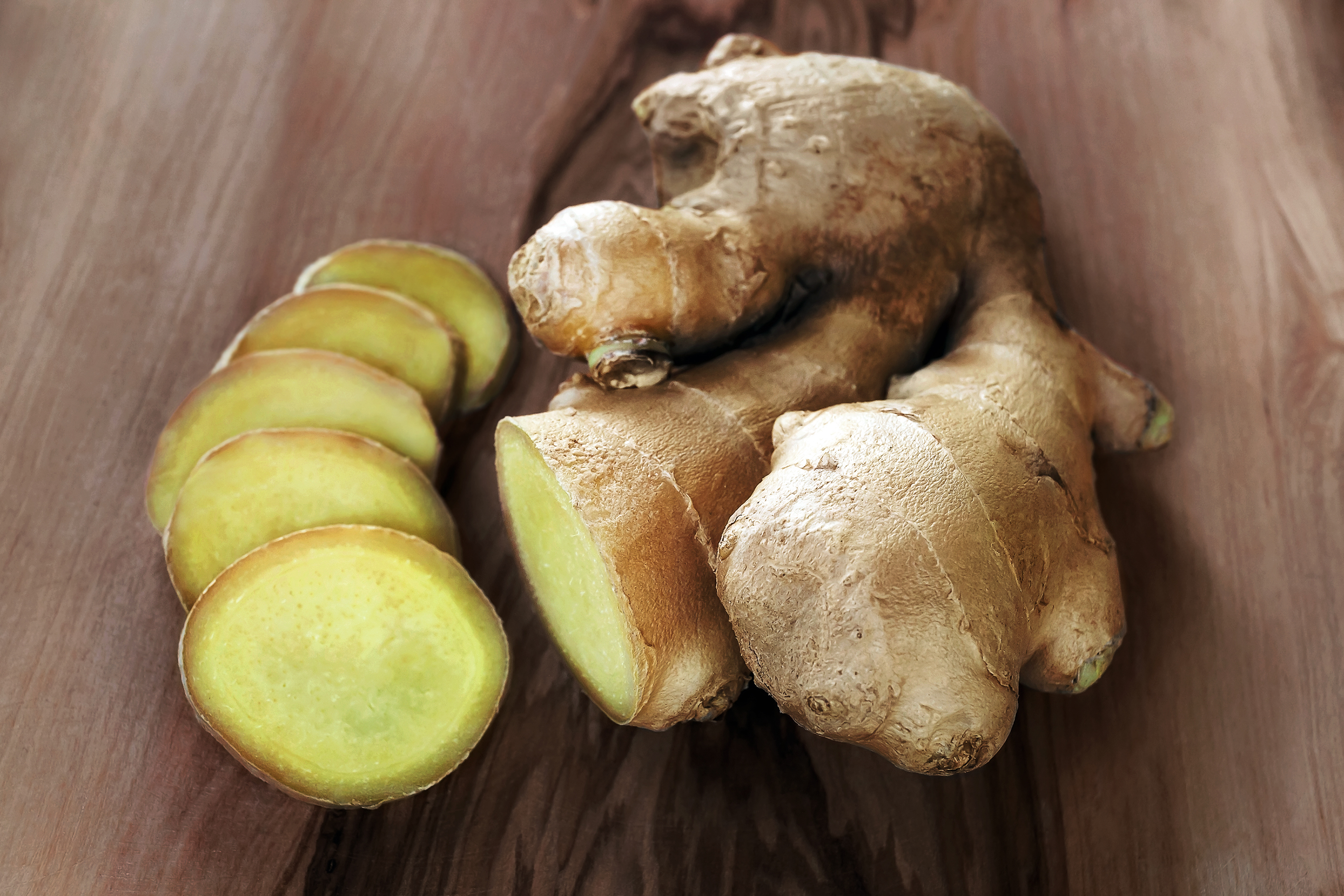 Close-Up Of Ginger On Wooden Table.