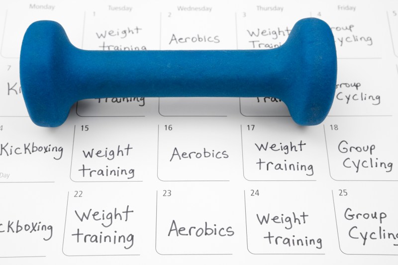 A dumbbell on an exercise plan.