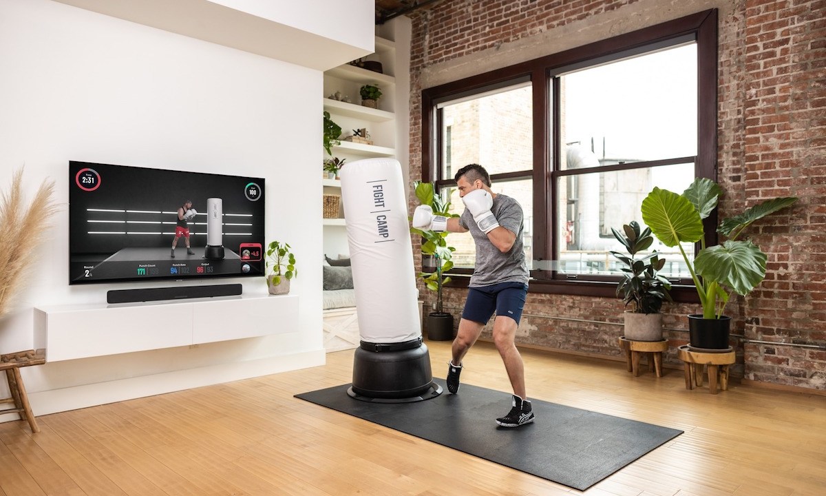 Man boxing with Fightcamp workout.