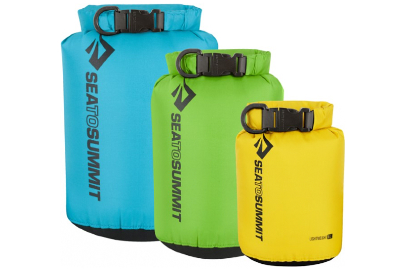 A pack of three Sea to Summit dry bags on a white background.