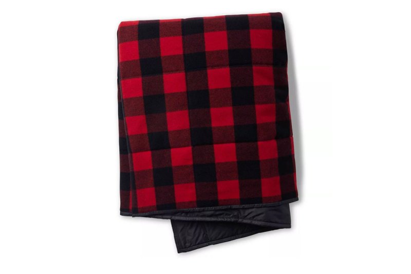 A checkered wool blanket from Smartwool on white background