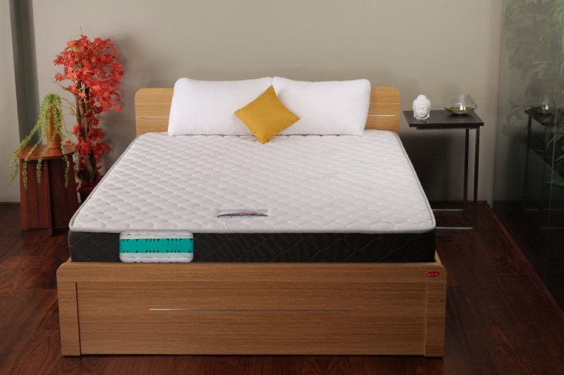 A memory foam mattress in a bedroom.