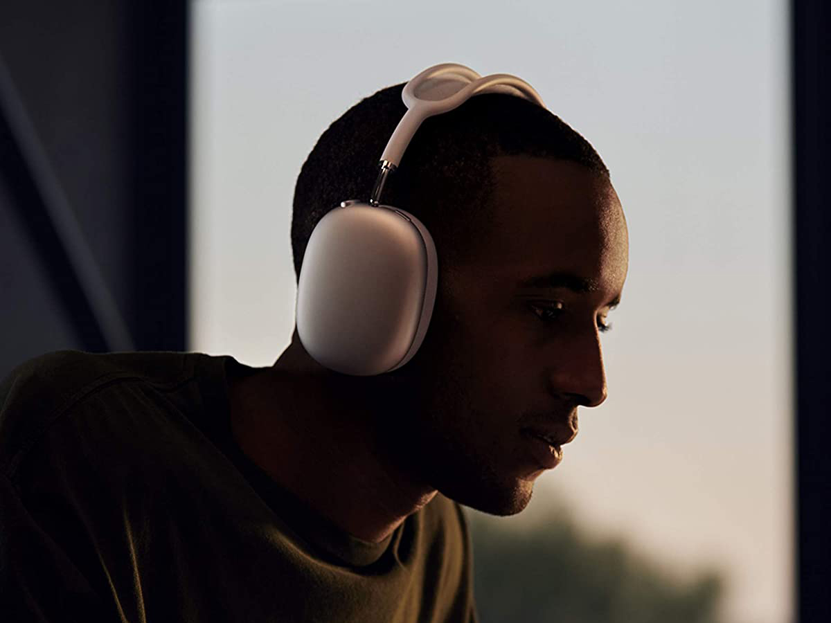 A man listening to headphones.