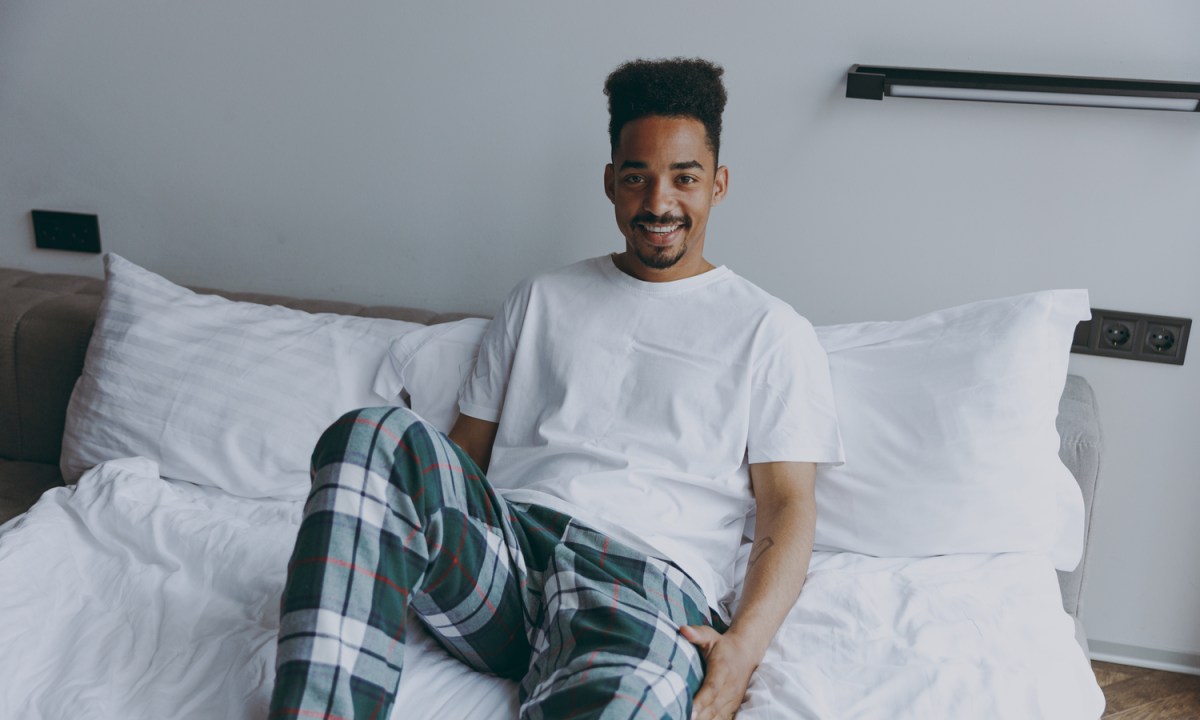 Man in bed wearing loungewear