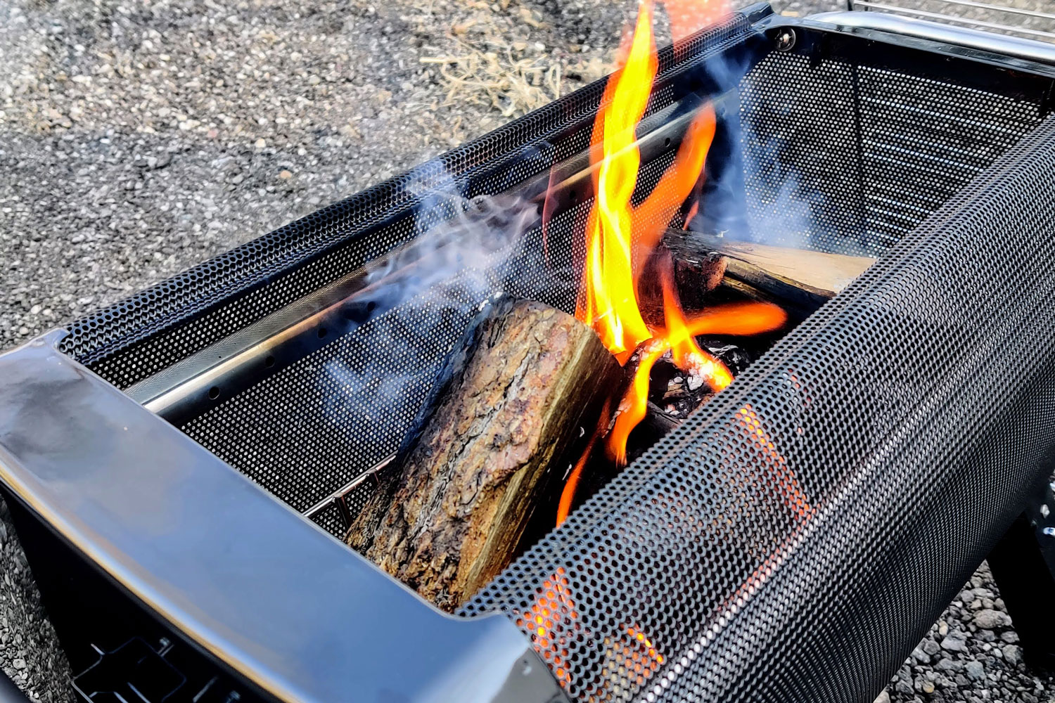 Closeup of campfire inside BioLite FirePit+ fire pit.