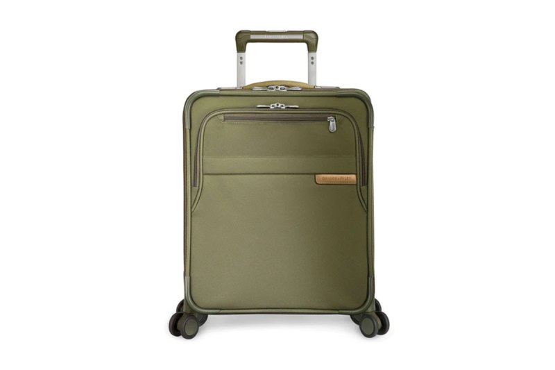 A Briggs & Riley International 21" Carry-on Expandable Wide-Body Spinner in olive on a white background.