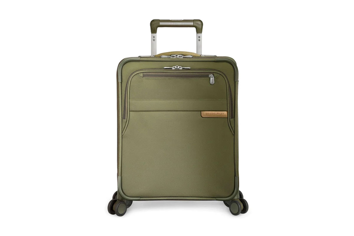 A Briggs & Riley International 21" Carry-on Expandable Wide-Body Spinner in olive on a white background.