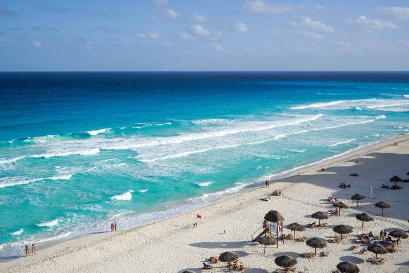 Palapas at the beach in Cancun, Mexico.