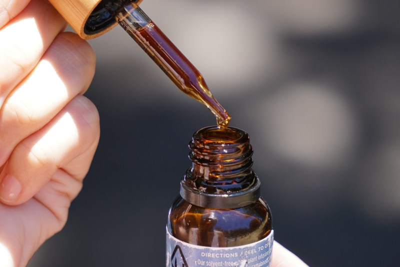 A CBD tincture with an oil dropper