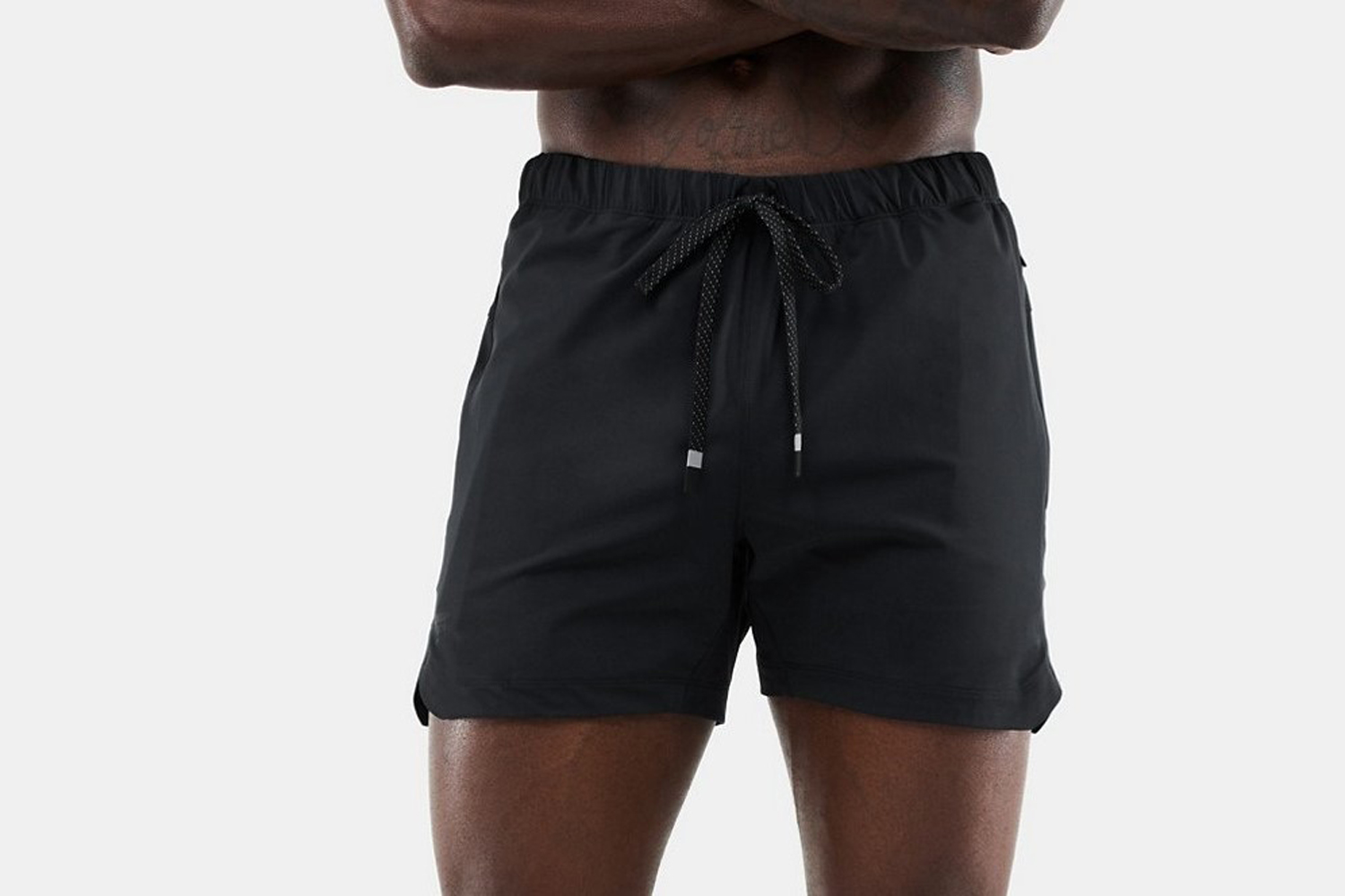 A Fabletics The One short on shirtless model.