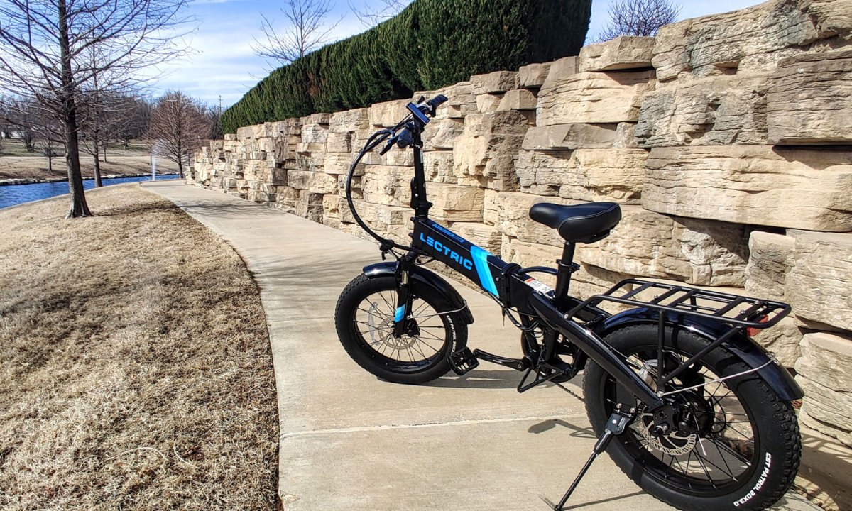 Lectric XP 2.0 Black electric bike on an outdoor walking path.