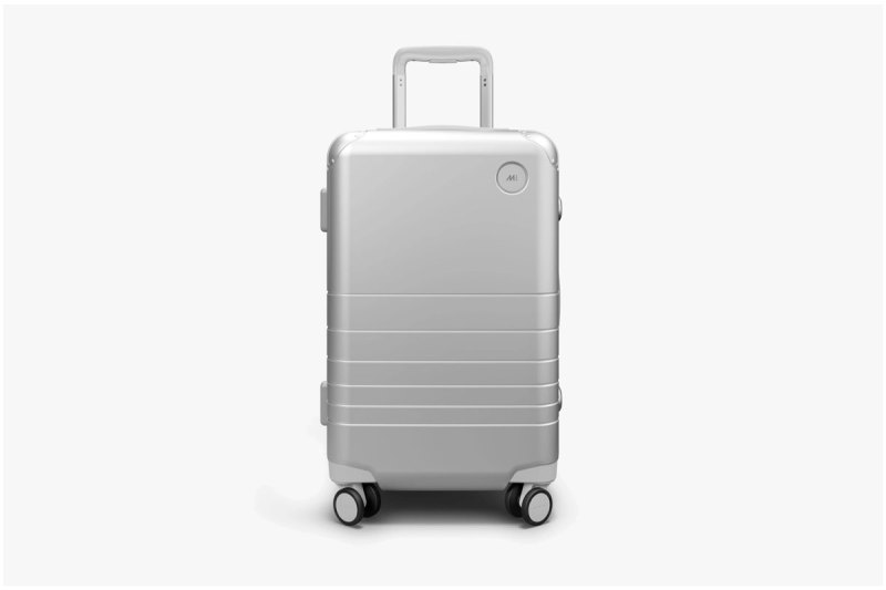 A Monos Hybrid Carry-on Luggage on a white background.