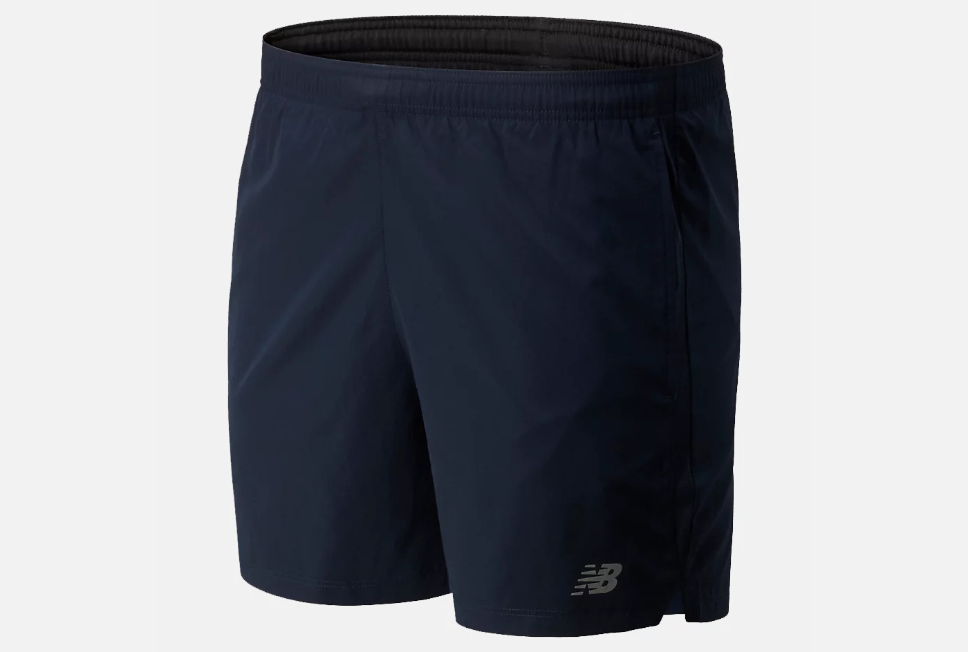 A New Balance Accelerate Shorts in navy on gray background.