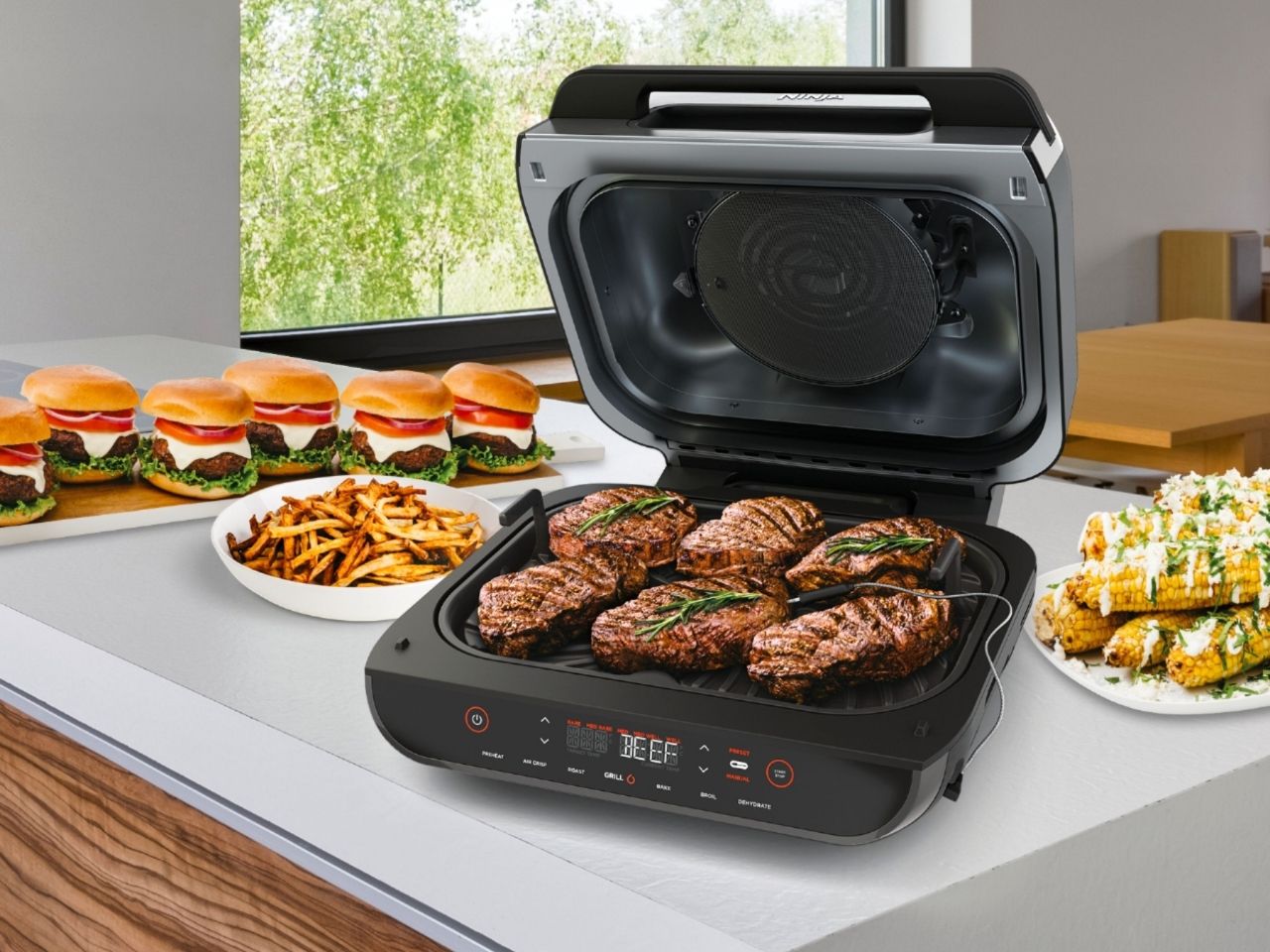 Ninja Foodi indoor grill grilling burgers.