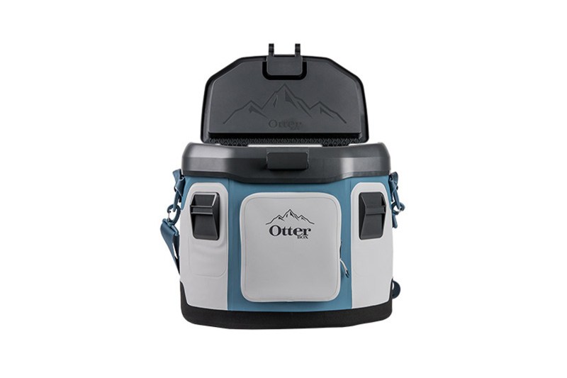 An Otterbox Trooper Cooler in blue and gray on plain background.