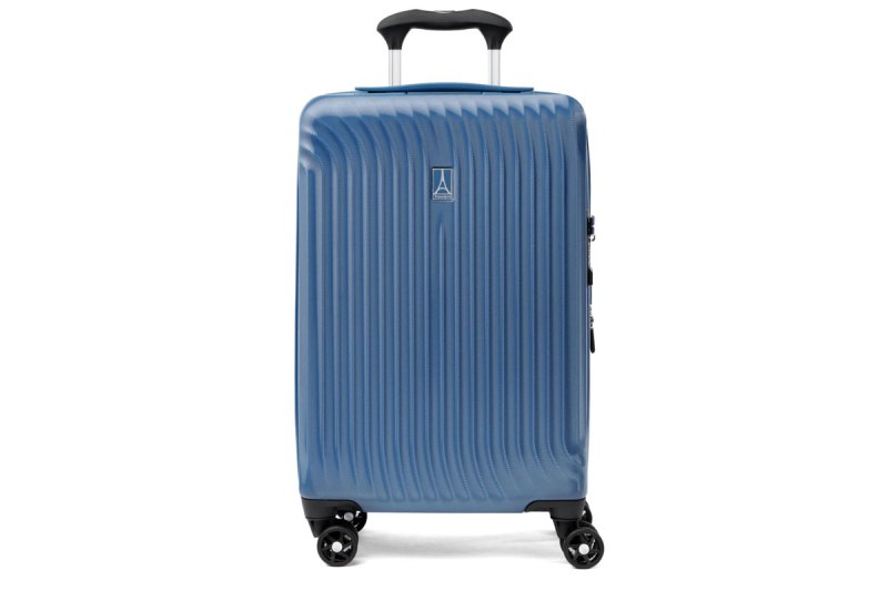 A Travelpro Maxlite Air Carry-on Expandable Hardside Spinner in Ensign Blue on a white background.