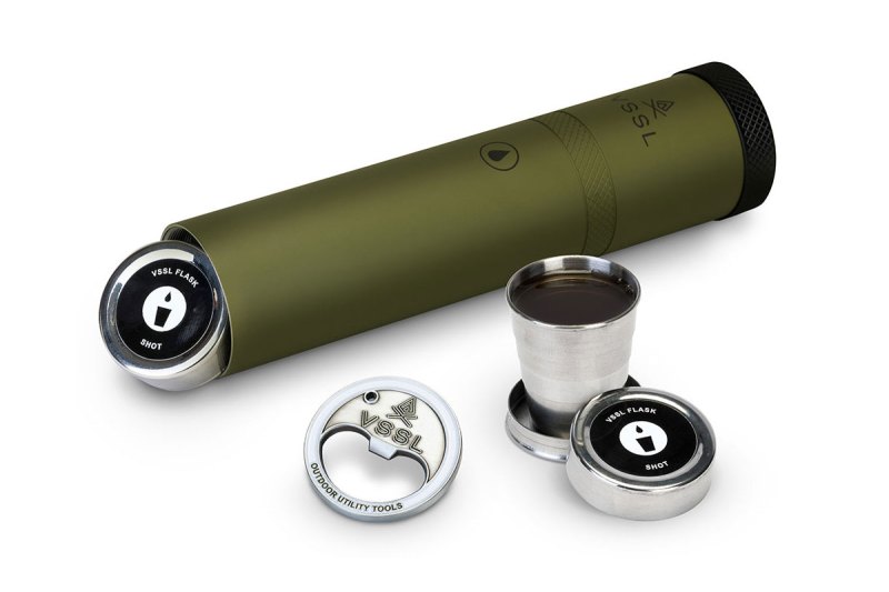 VSSL Flask in green with shot glasses and a bottle opener on a plain white background.