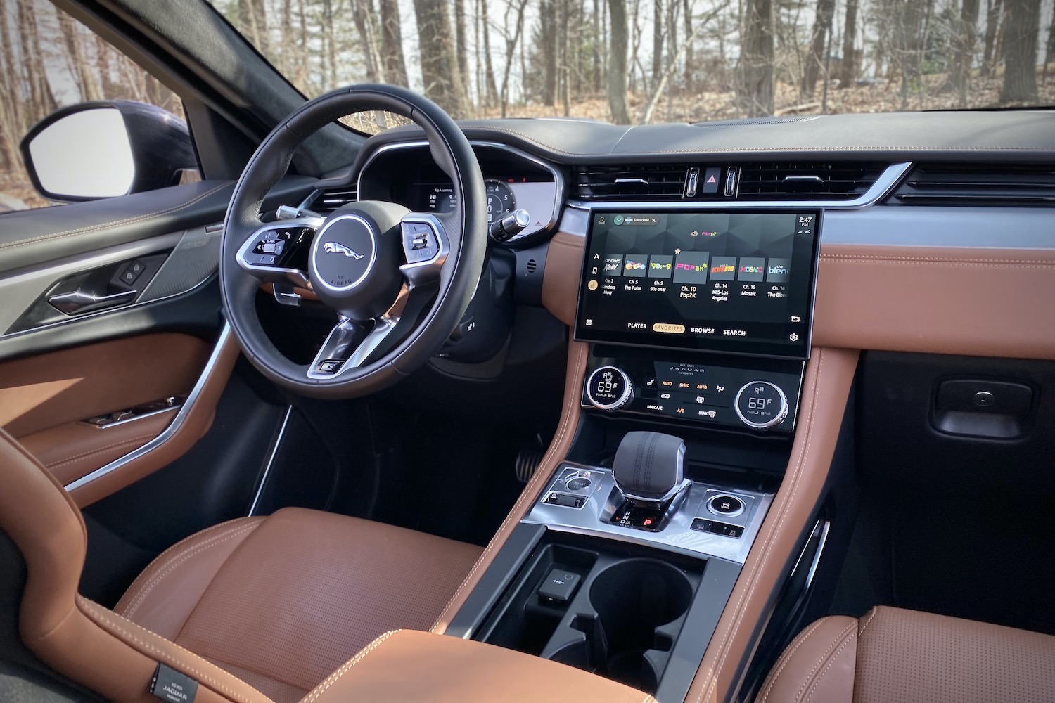 2022 Jaguar F-Pace R Dynamic S center console and steering wheel from back seats.