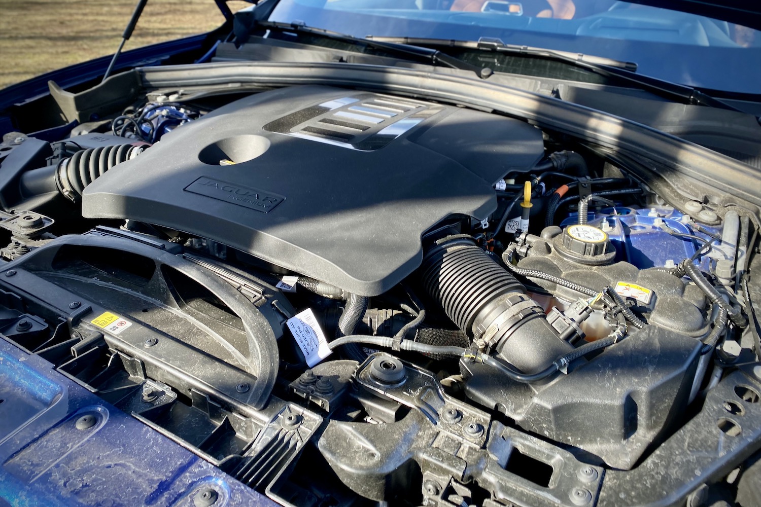 Engine bay of 2022 Jaguar F-Pace R Dynamic S close up shot.