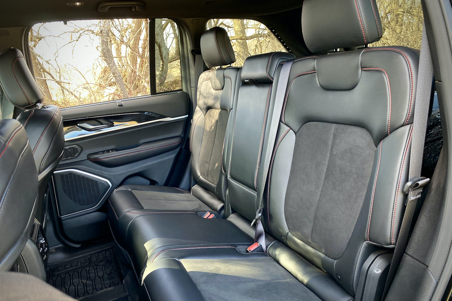 2022 Jeep Grand Cherokee Trailhawk rear seats from the driver's side.