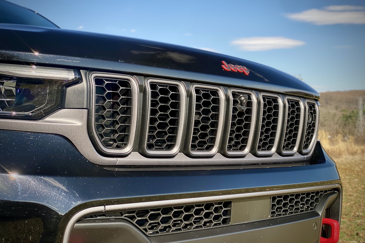 2022 Jeep Grand Cherokee Trailhawk close up of front grille.