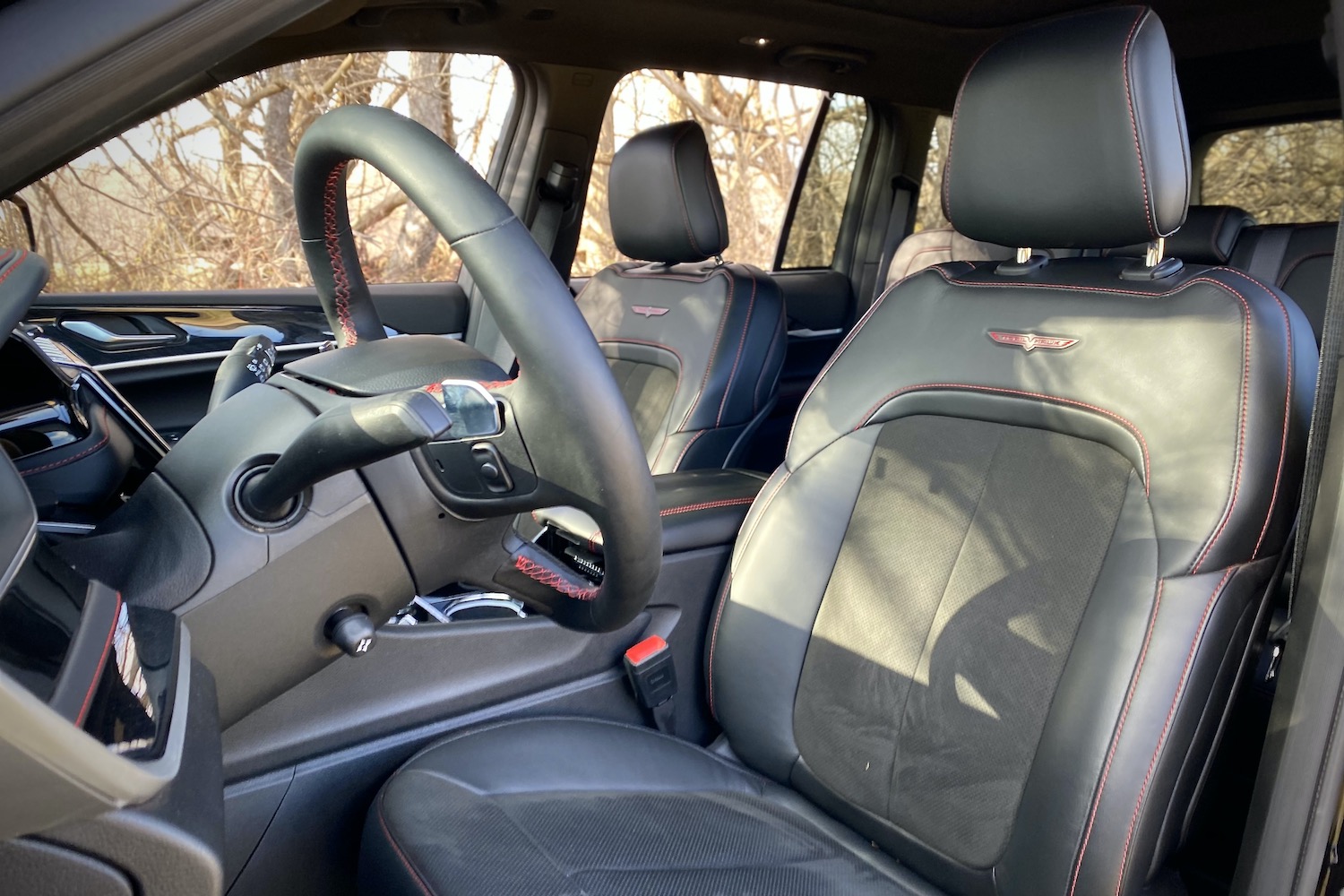 Front driver's seat in 2022 Jeep Grand Cherokee Trailhawk from outside the SUV.