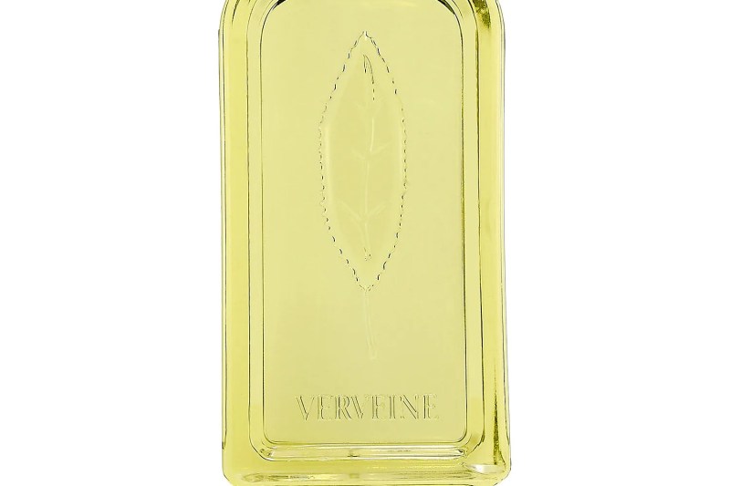 A close-up of a bottle of L'Occitane Verbena shower gel.