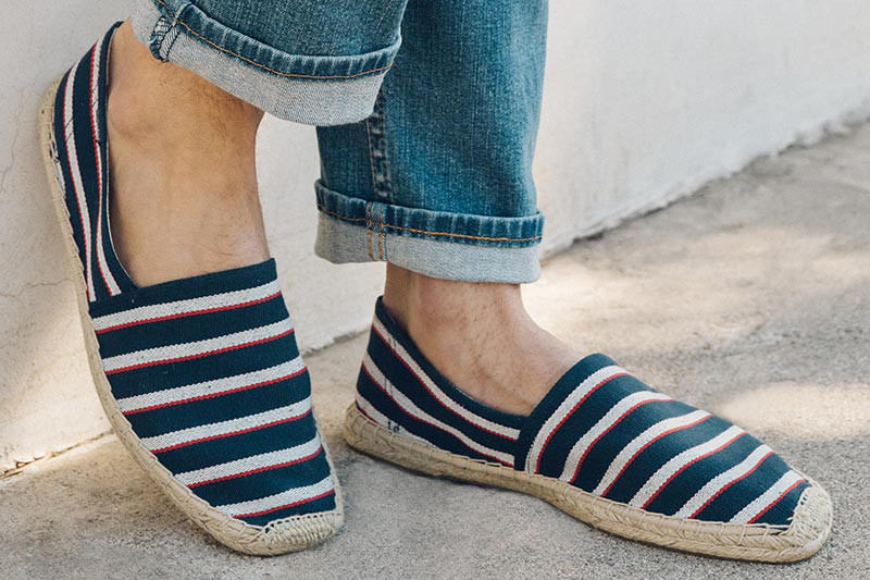 Blue with white and red stripe espadrilles from Soludos.