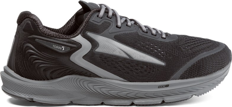 A gray and black men's sneaker on a white background.
