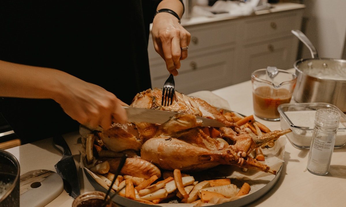 Cutting a chicken for dinner