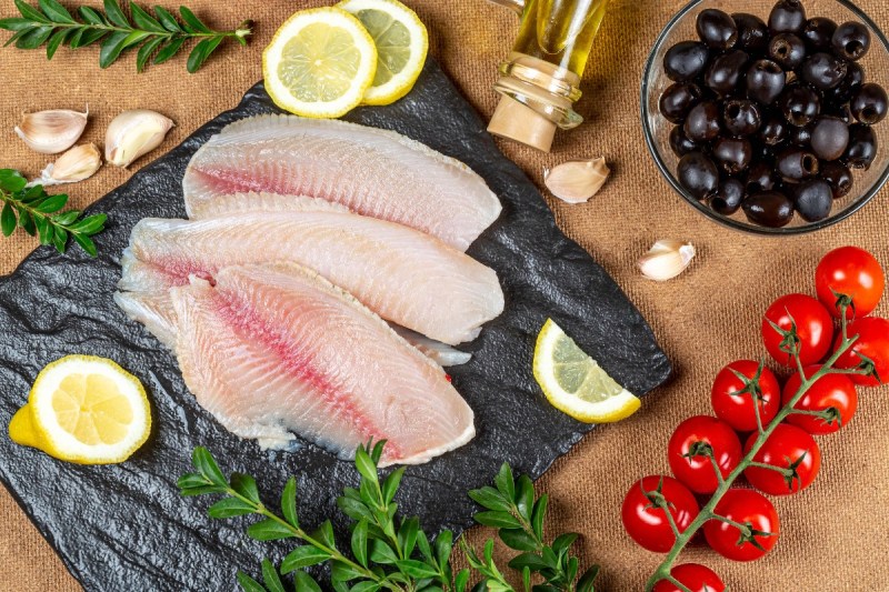 fresh fillets of fish about to be cooked.