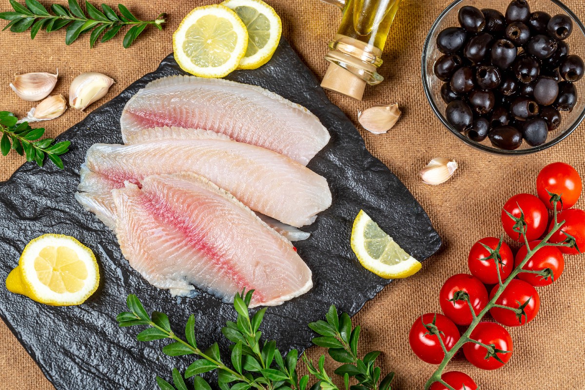 fresh fillets of fish about to be cooked.