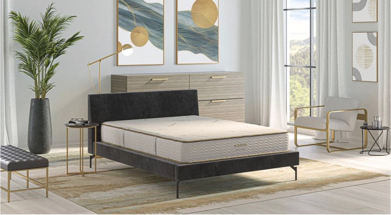 saatva modern foam mattress in a chic modern bedroom