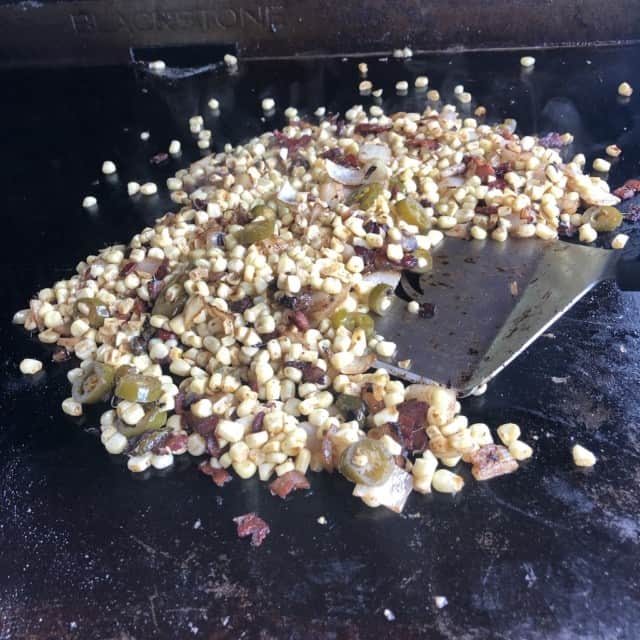 Corn with bacon and jalapeno on the griddle grill