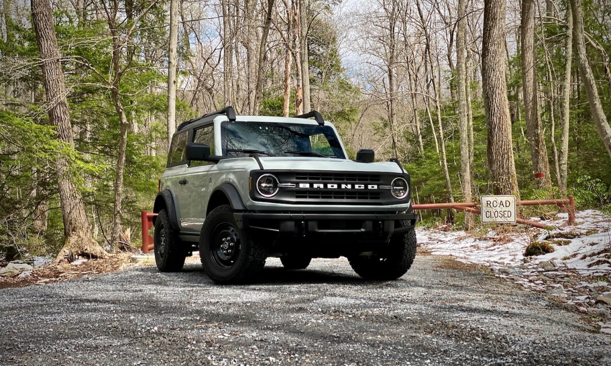 2021 Ford Bronco front end angle from passenger side on a gravel path